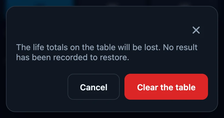 The confirmation dialog over the menu, warning that the life totals on the table will be lost, with a Cancel button and a red Clear the table button.